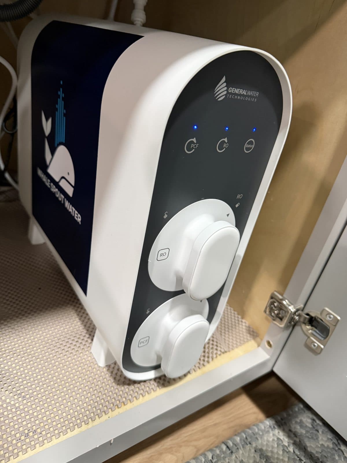Under-sink reverse osmosis system installed in a Phoenix kitchen cabinet