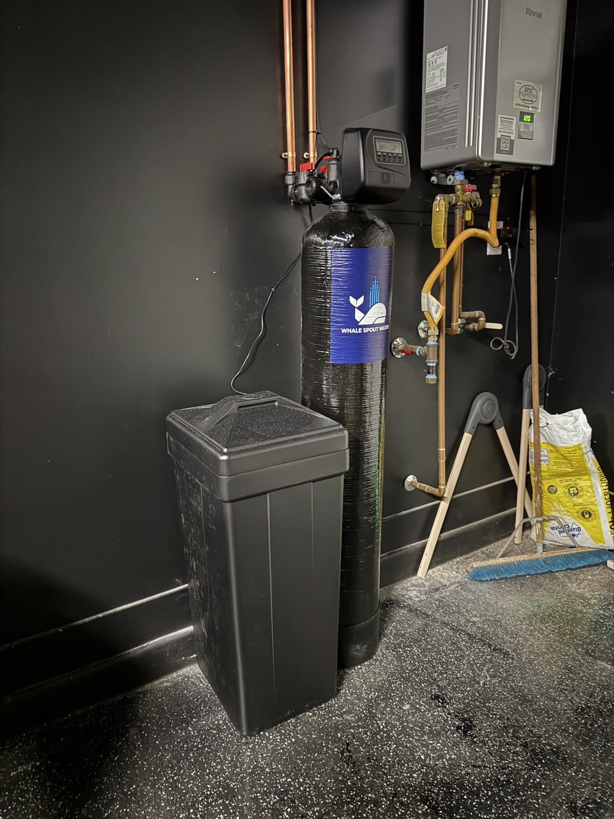 Whale Spout Water softener installed beside a tankless water heater in a Phoenix-area garage